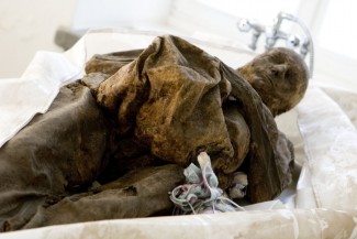 300-летняя мумия девочки открыла глаза 