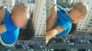 Мужчина вывесил собственного сына из окна 15-го этажа ради 1000 лайков
