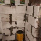 Коммунальщики заделали зияющую дыру в стене дома на Кулибина